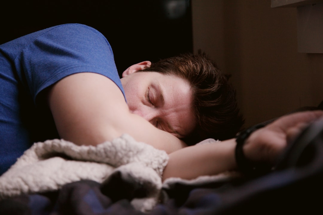 a person lying in a bed